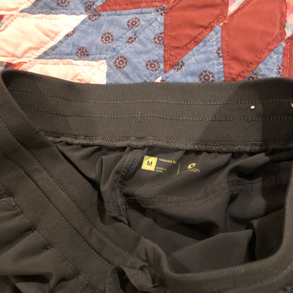 3 pairs of Xersion Capri pants.